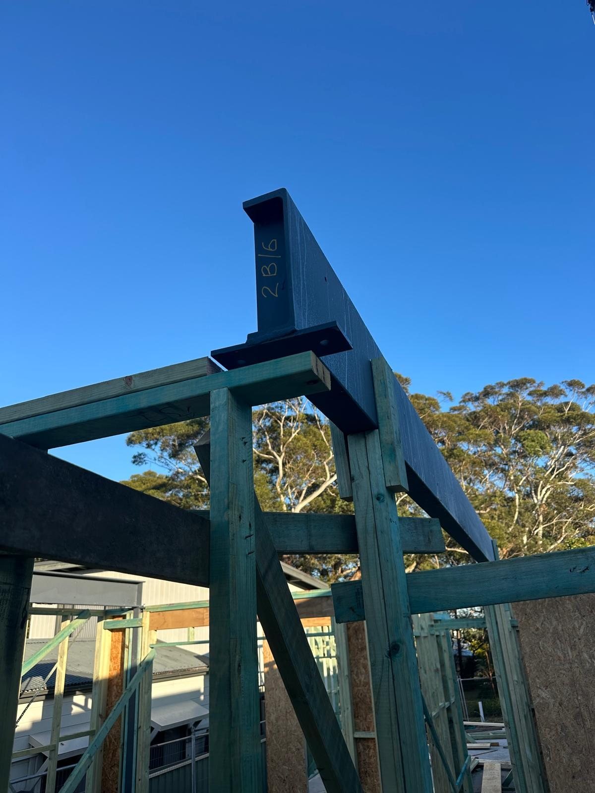 Steel beams installed in the timber-framed extension