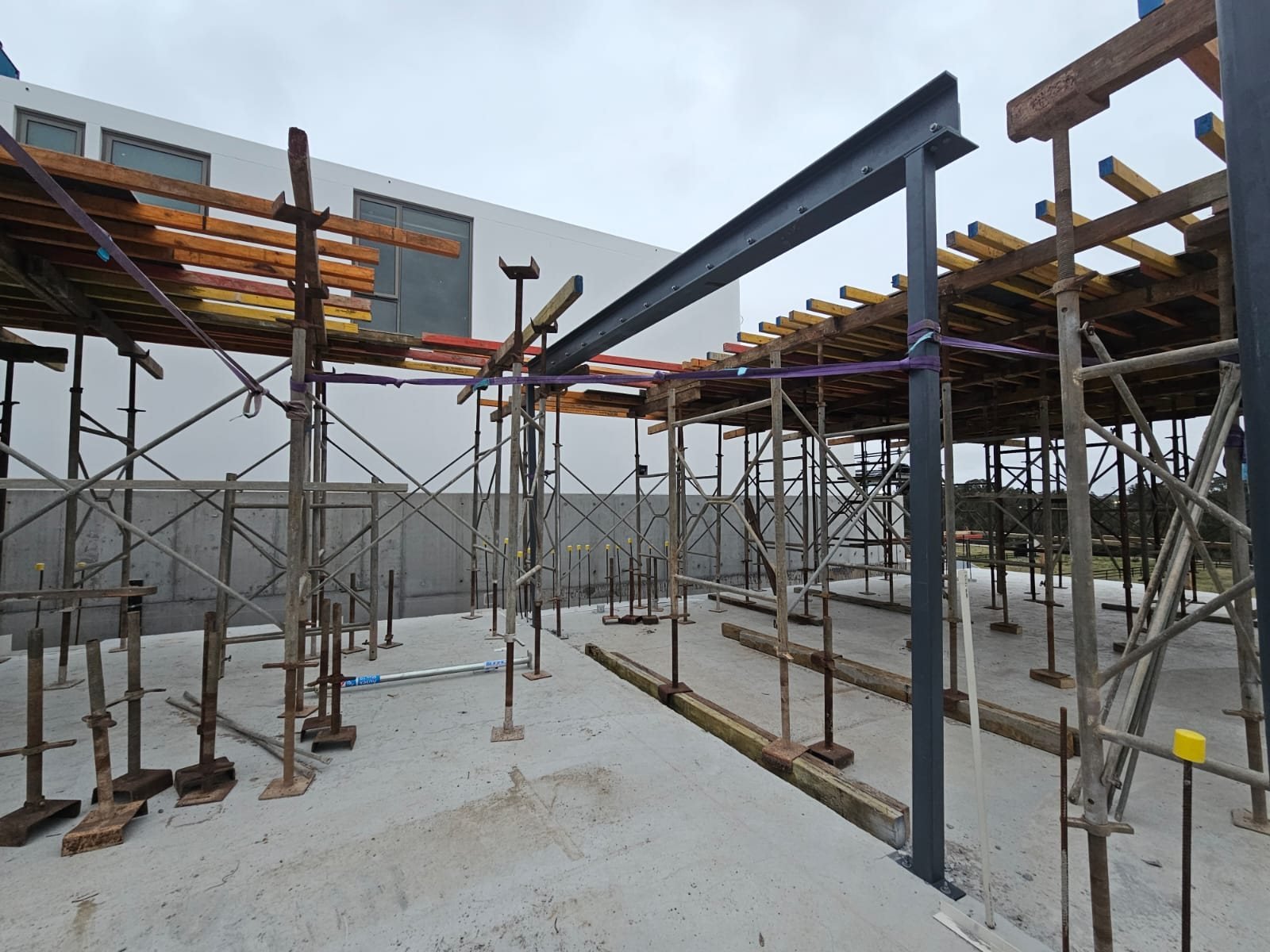 Structural steel frame with scaffolding