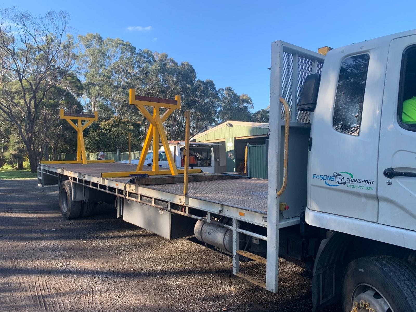 Yellow beam racks fitted to the flatbed truck